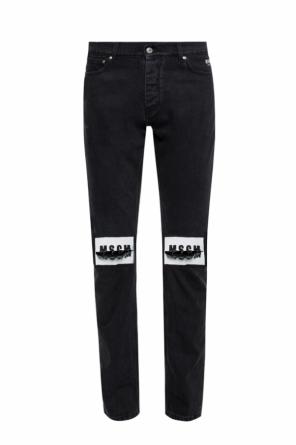 Jeans with holes and a logo, zdjęcie 1 Jeans with holes and a logo od MSGM